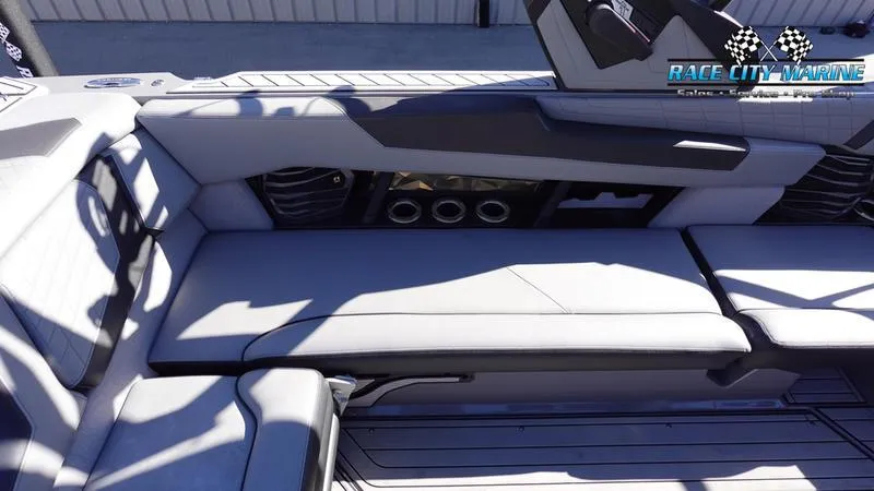 Slide: The Image of 2021 Nautique Super Air Nautique G25 interior seating with sleek design and premium materials. - 23