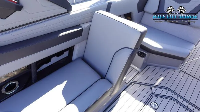 Slide: The Image of 2021 Nautique Super Air Nautique G25 interior with sleek seating and modern design. - 25