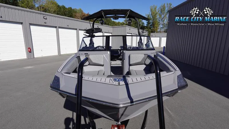 Slide: The Image of 2021 Nautique Super Air Nautique G25 boat at Race City Marine dealership. - 3