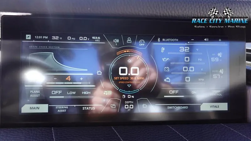 Slide: The Image of Dashboard display of 2021 Nautique Super Air Nautique G25 boat with control settings. - 35
