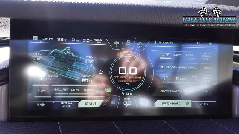 Slide: The Image of Dashboard display of 2021 Nautique Super Air Nautique G25 boat with control settings. - 36
