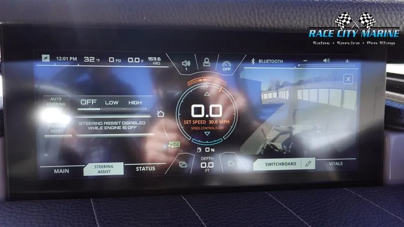 Slide: The Image of Dashboard display of 2021 Nautique Super Air Nautique G25 boat with digital controls. - 37