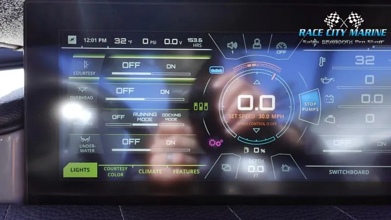 Slide: The Image of Dashboard of 2021 Nautique Super Air Nautique G25 boat with control settings. - 38