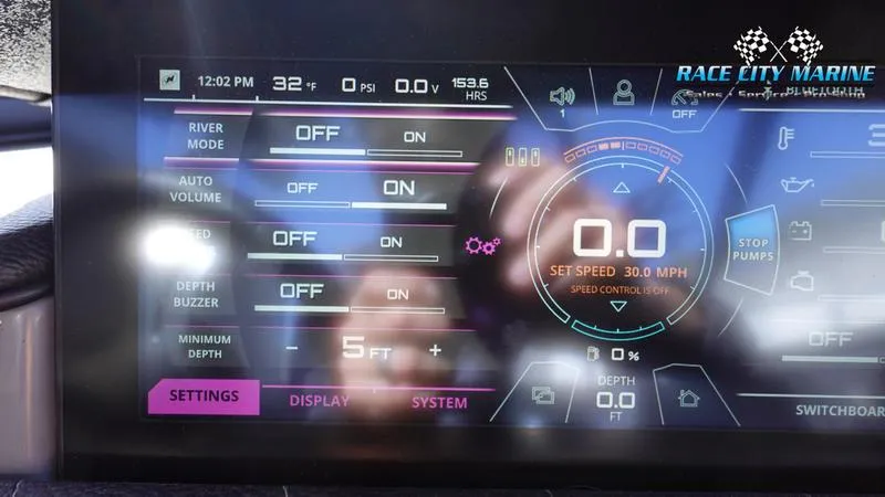 Slide: The Image of 2021 Nautique Super Air Nautique G25 dashboard display with control settings and speed indicators. - 39