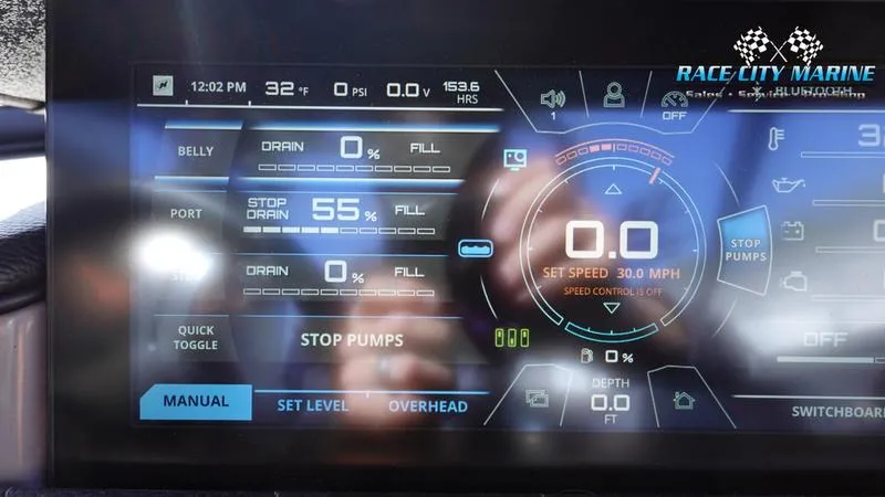 Slide: The Image of Dashboard of 2021 Nautique Super Air Nautique G25 boat, showing speed and ballast controls. - 40