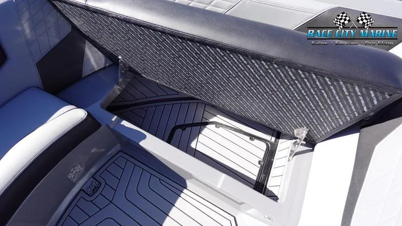 Slide: The Image of 2021 Nautique Super Air Nautique G25 interior storage compartment open. - 44