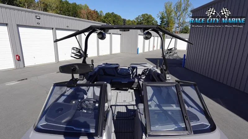 Slide: The Image of 2021 Nautique Super Air Nautique G25 boat at Race City Marine dealership. - 46