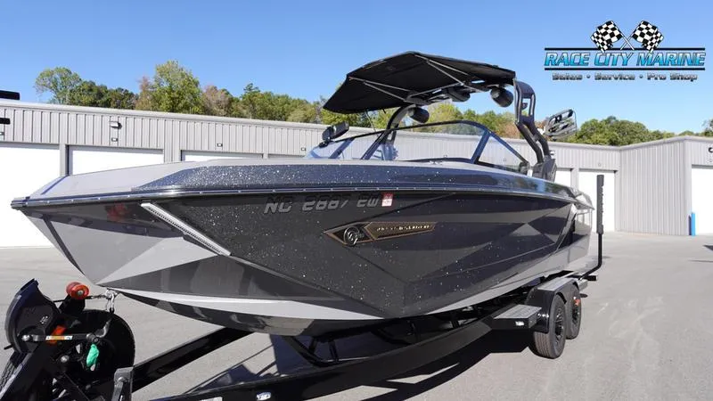Slide: The Image of 2021 Nautique Super Air Nautique G25 boat on trailer at Race City Marine. - 6