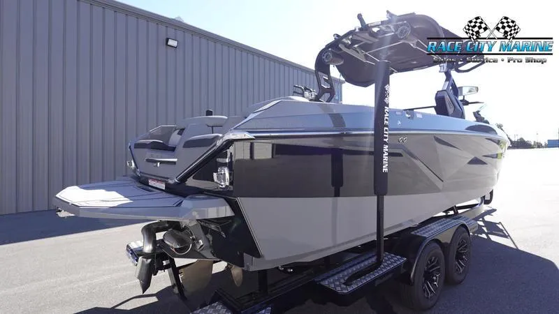 Slide: The Image of 2021 Nautique Super Air Nautique G25 boat on trailer at Race City Marine. - 8