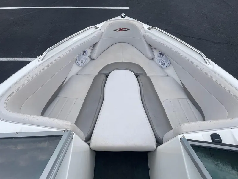 Slide: The Image of 2005 MasterCraft X-10 boat interior with white and gray seating. - 14