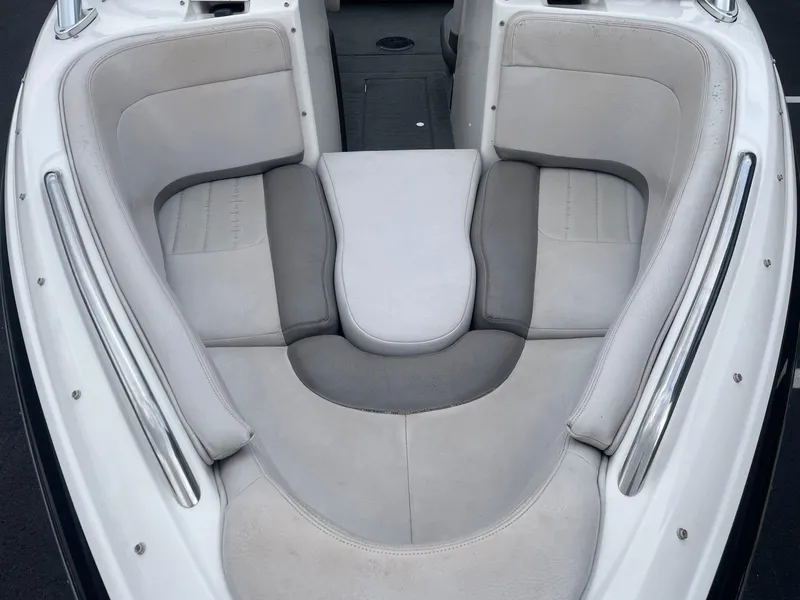 Slide: The Image of 2005 MasterCraft X-10 boat interior seating with gray and white upholstery. - 15