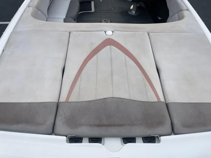 Slide: The Image of 2005 MasterCraft X-10 boat interior seating with beige and brown upholstery. - 16