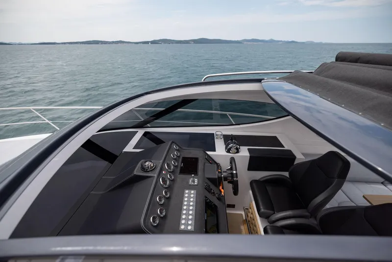 Slide: The Image of Helm of 2025 Focus Power 36 yacht with ocean view. - 20
