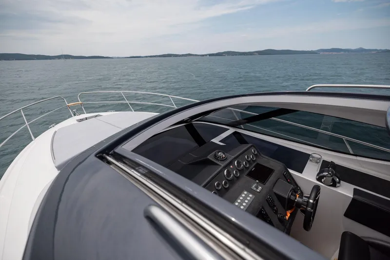 Slide: The Image of Helm of 2025 Focus Power 36 yacht with ocean view. - 21