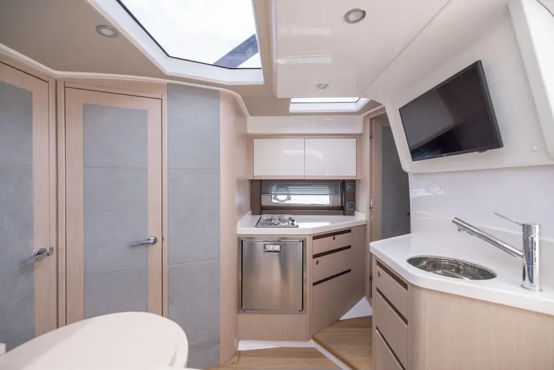 Slide: The Image of Modern kitchen interior of 2025 Focus Power 36 yacht with sleek design and appliances. - 26