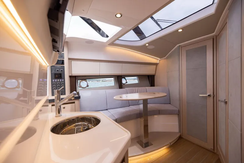Slide: The Image of Luxurious interior of 2025 Focus Power 36 yacht with modern seating and skylight. - 27
