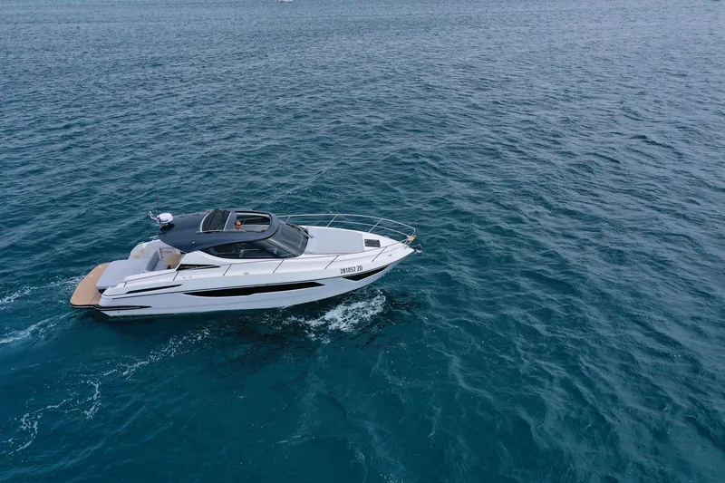 Slide: The Image of 2025 Focus Power 36 yacht cruising on open blue sea. - 6