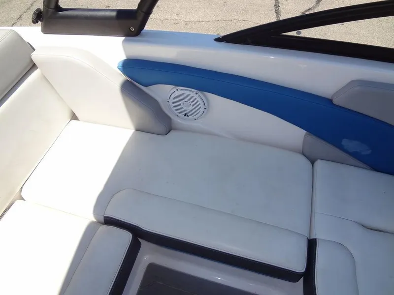 Slide: The Image of 2019 Regal 1900 ESX boat interior with white and blue seating. - 15