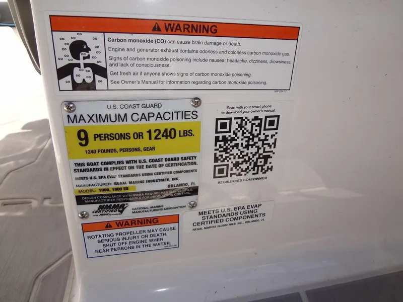 Slide: The Image of Warning and capacity labels on a 2019 Regal 1900 ESX boat. - 25