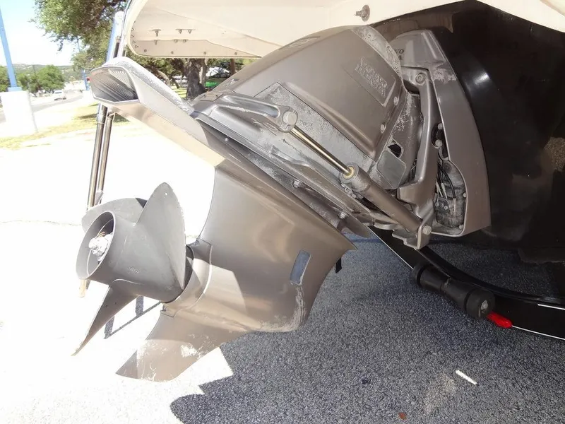 Slide: The Image of 2019 Regal 1900 ESX boat outboard motor close-up. - 27