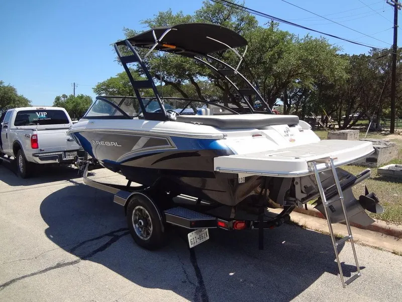 Slide: The Image of 2019 Regal 1900 ESX boat on trailer, rear view. - 3