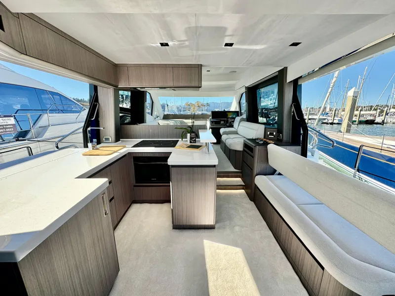 Slide: The Image of Luxurious interior of 2025 Galeon 500 Fly yacht with modern design and spacious seating. - 17