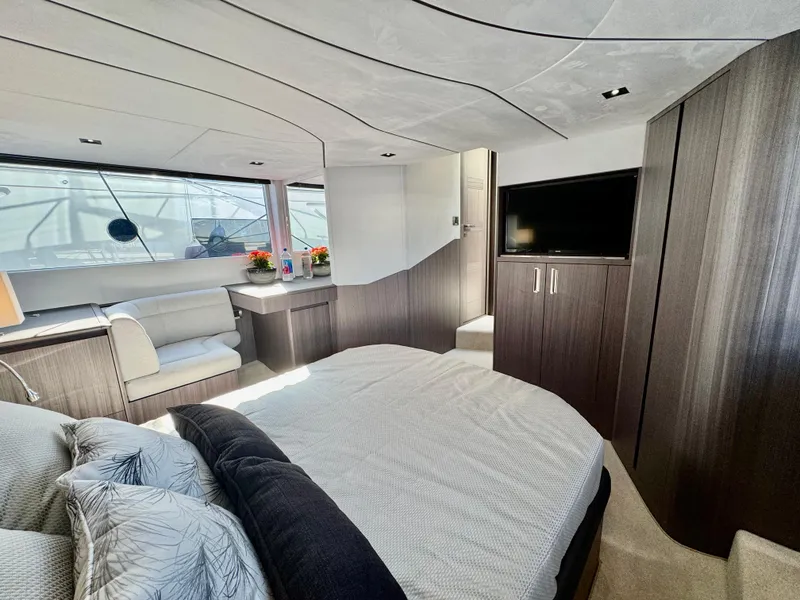 Slide: The Image of Luxurious interior of 2025 Galeon 500 Fly yacht with modern furnishings and large windows. - 40