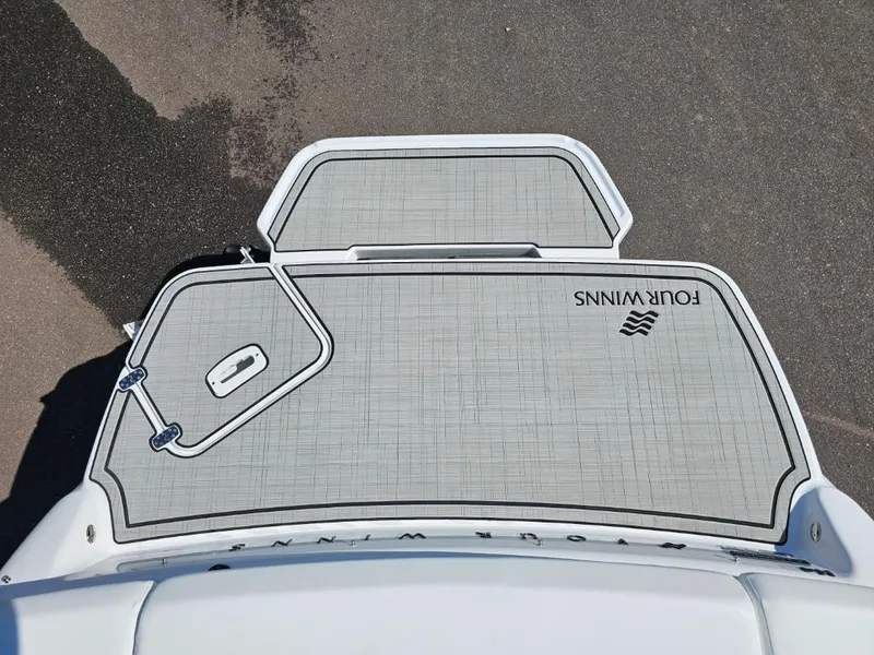 Slide: The Image of 2025 Four Winns H4 boat swim platform with non-slip surface. - 17