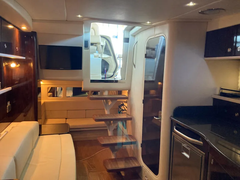 Slide: The Image of Interior of 2016 Sea Ray 330 Sundancer yacht with modern amenities and stylish design. - 17