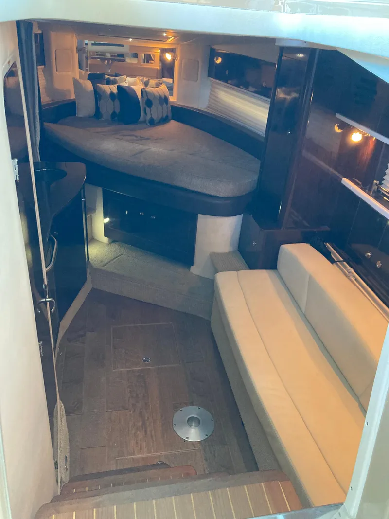 Slide: The Image of Interior of 2016 Sea Ray 330 Sundancer with cozy seating and elegant design. - 21