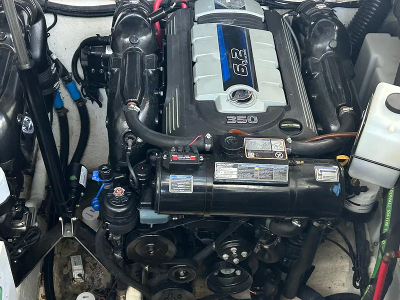 Slide: The Image of Engine compartment of a 2016 Sea Ray 330 Sundancer, featuring a 6.2L 350 horsepower engine. - 24