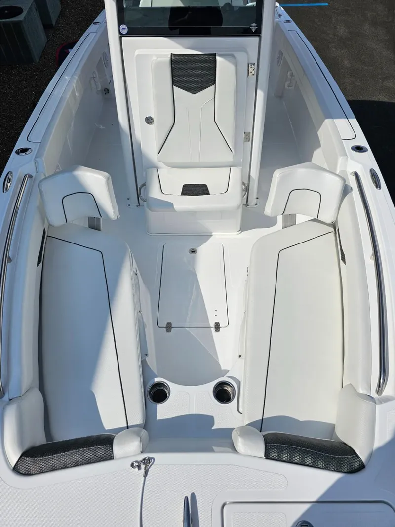 Slide: The Image of 2025 Wellcraft 223 Fisherman boat interior with sleek white seating and modern design. - 11