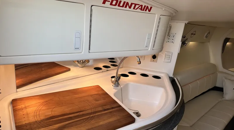 Slide: The Image of Interior of 2007 Fountain 47 Lightning boat with kitchenette and seating area. - 26