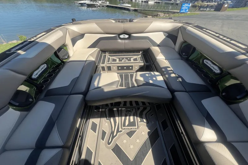 Slide: The Image of Interior of 2023 Centurion Ri265 boat with luxurious seating. - 13