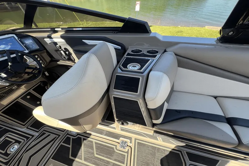 Slide: The Image of Interior of a 2023 Centurion Ri265 boat with modern seating. - 15