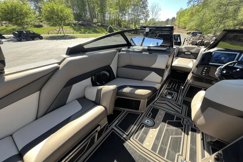Slide: The Image of Interior of 2023 Centurion Ri265 with luxurious seating and modern design. - 16