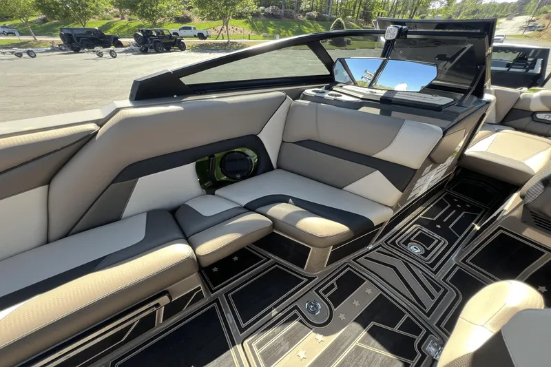 Slide: The Image of Interior of 2023 Centurion Ri265 with luxurious seating and modern design. - 17