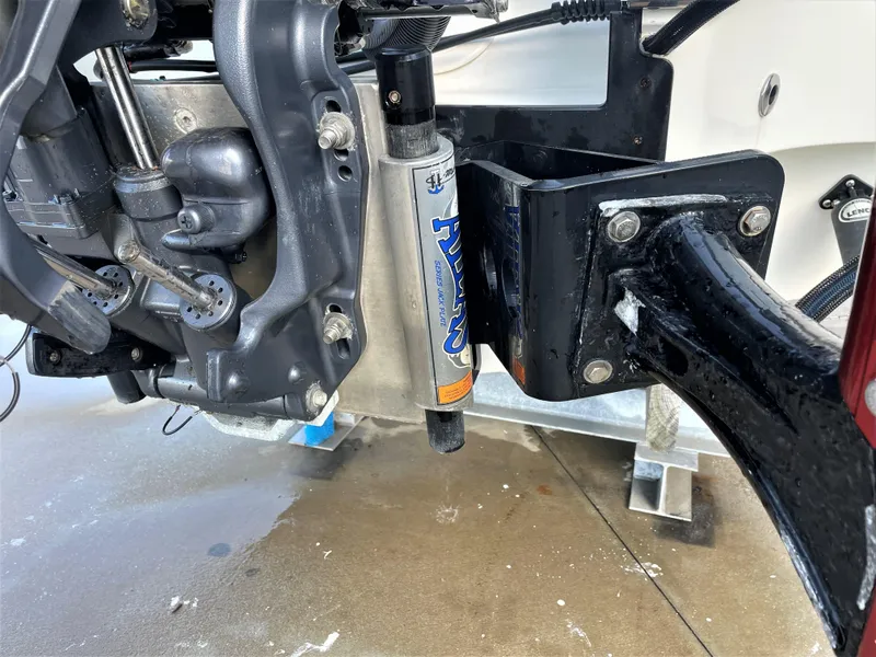 Slide: The Image of Close-up of 2017 Pathfinder 2300 HPS boat engine and hydraulic system. - 19