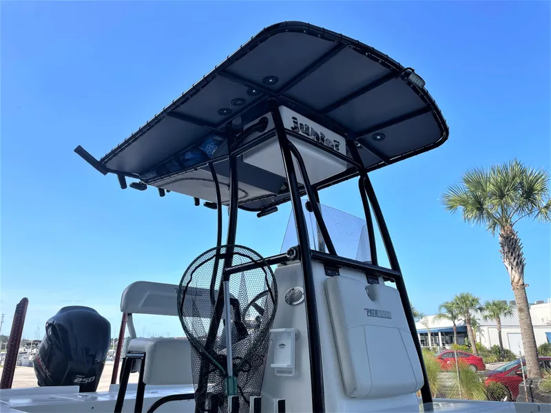 Slide: The Image of 2017 Pathfinder 2300 HPS boat with T-top and outboard motor. - 24