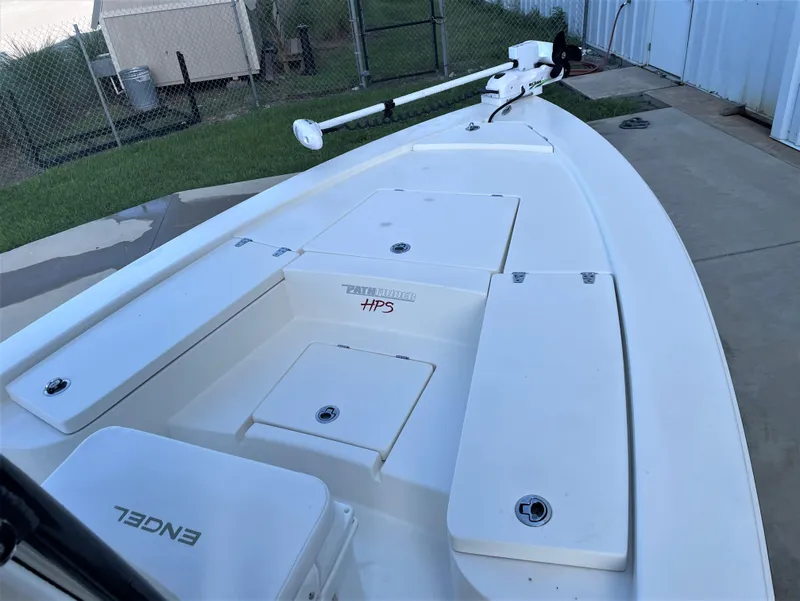 Slide: The Image of 2017 Pathfinder 2300 HPS boat with storage compartments and trolling motor. - 26