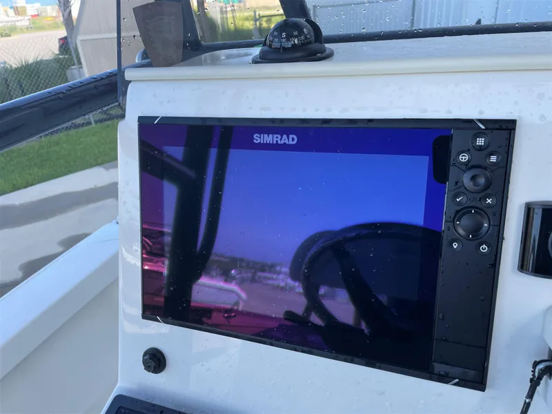 Slide: The Image of Simrad navigation display on a 2017 Pathfinder 2300 HPS boat. - 37