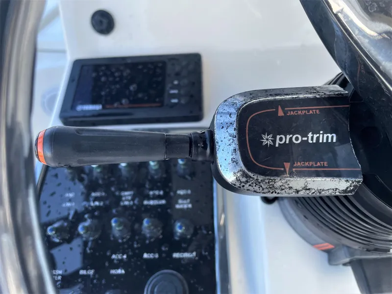 Slide: The Image of Close-up of 2017 Pathfinder 2300 HPS boat's pro-trim jackplate control. - 43