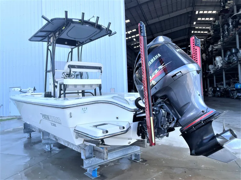 Slide: The Image of 2017 Pathfinder 2300 HPS boat with Yamaha outboard motor in storage facility. - 5