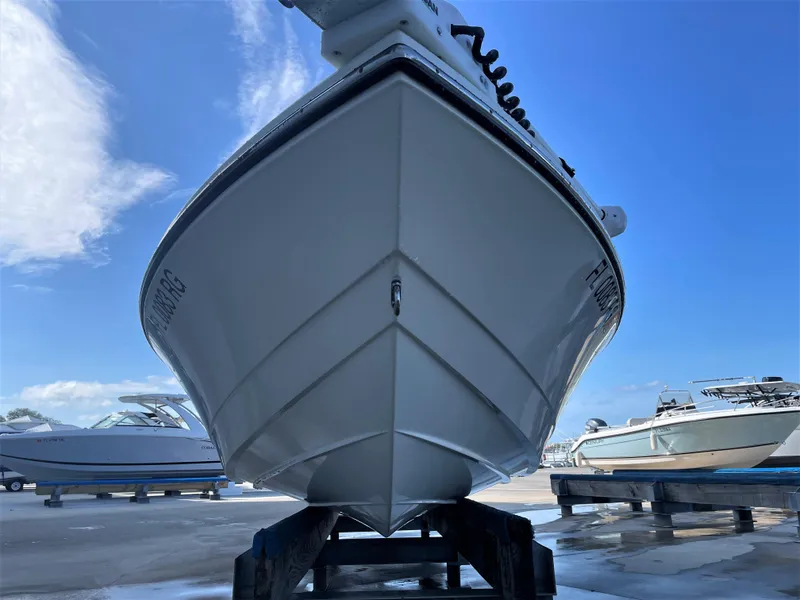 Slide: The Image of 2017 Pathfinder 2300 HPS boat on a stand, viewed from the front. - 7