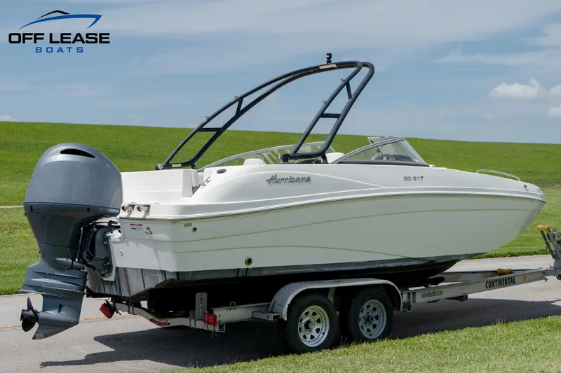 Slide: The Image of 2020 Hurricane 217 SD boat on trailer, displayed by Off Lease Boats. - 5