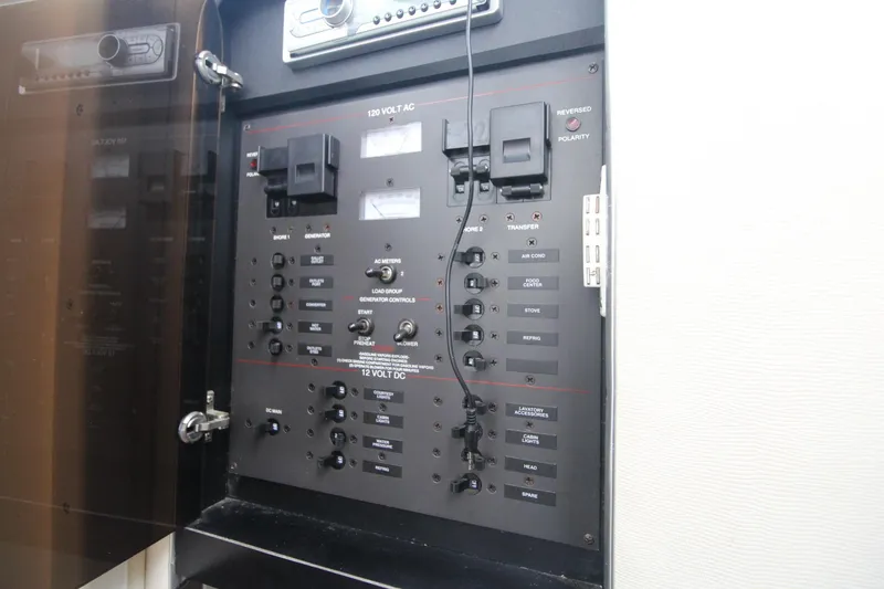 Slide: The Image of Electrical control panel on a 1998 Wellcraft 3200 Martinique boat. - 26