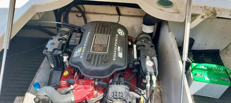 Slide: The Image of 2006 Monterey 234 FS boat engine compartment with Volvo Penta engine. - 9