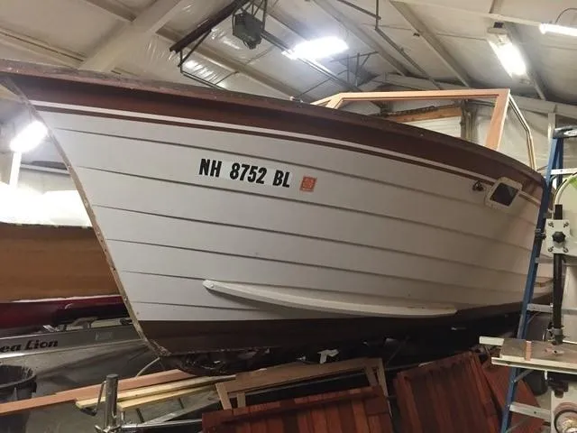 Slide: The Image of 1986 Skiff Craft Sport Fisherman 260 boat in indoor storage. - 2