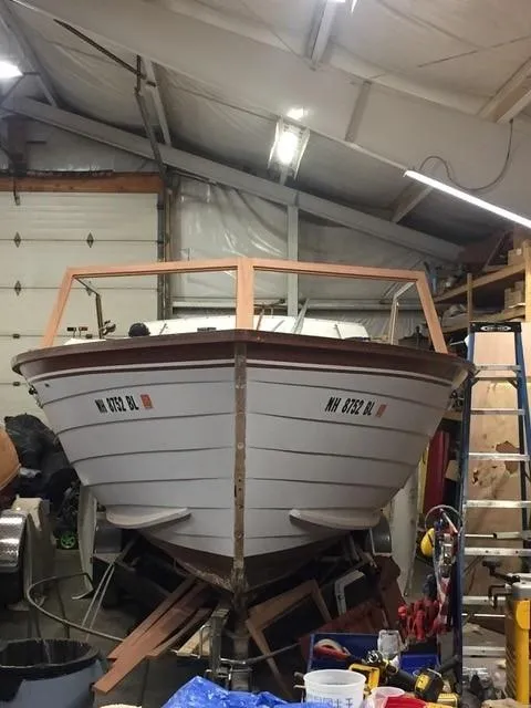 Slide: The Image of 1986 Skiff Craft Sport Fisherman 260 in a workshop. - 4