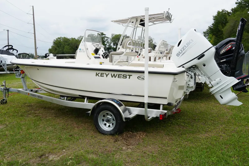 Slide: The Image of 2024 Key West 188 Bay Reef boat on trailer, Suzuki engine. - 2